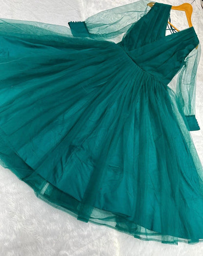 Green net heavy flair plain party wear gown