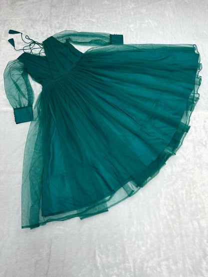 Green net heavy flair plain party wear gown