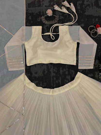 Off White Organza Print and Lace Border Ceremonial Lehenga Choli