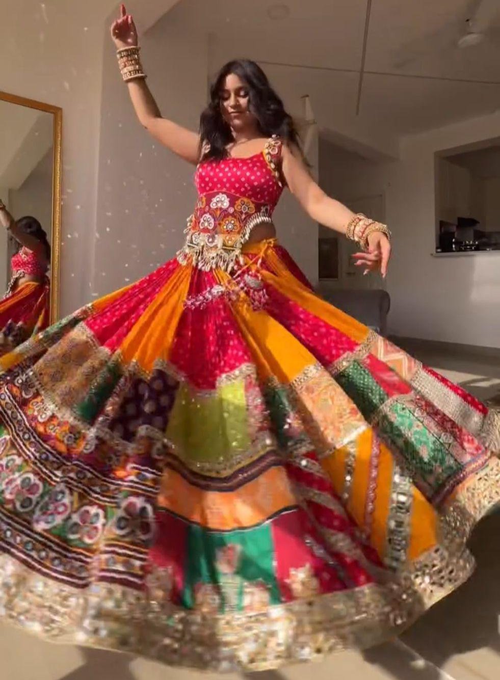 Orange pink print mirror work navratri lehenga chaniya choli