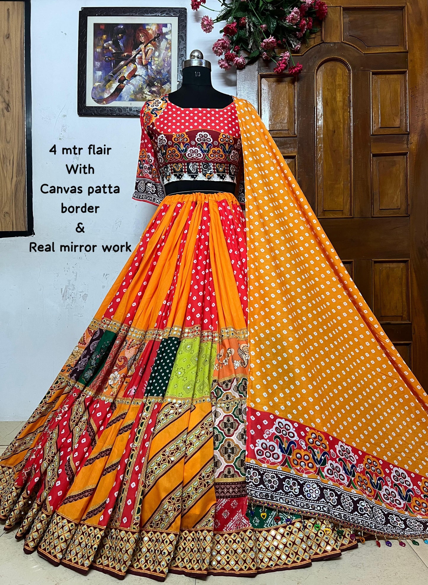 Orange pink print mirror work navratri lehenga chaniya choli