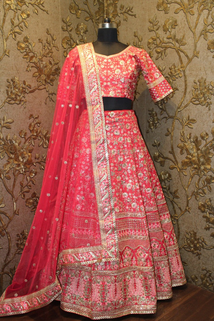 Pink floral embroidery on pink base art silk bridal lehenga