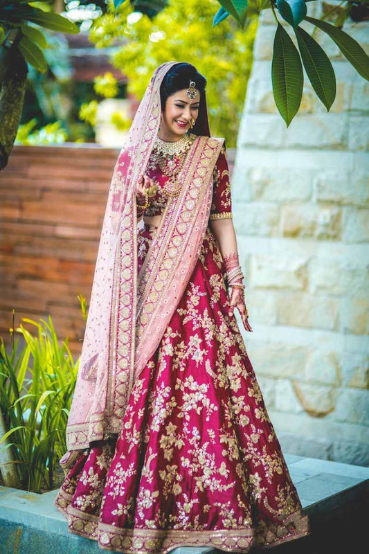 Bridal Lehenga choli with heavy lace work on dupatta