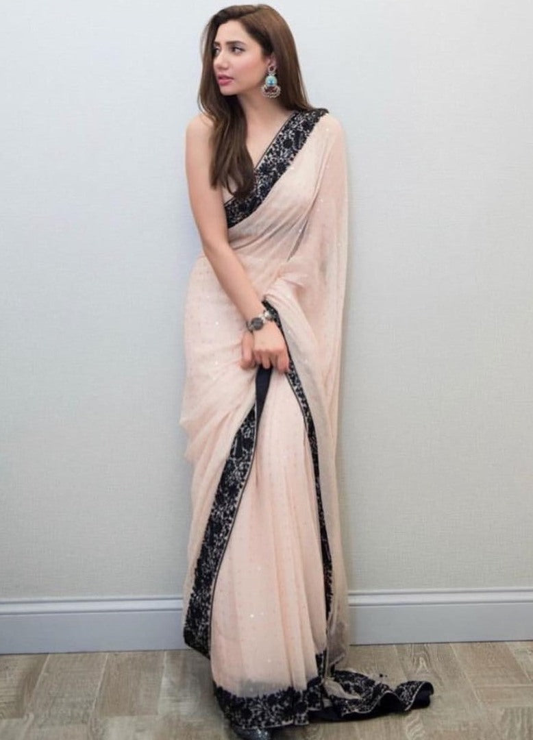 Cream georgette sequence work saree