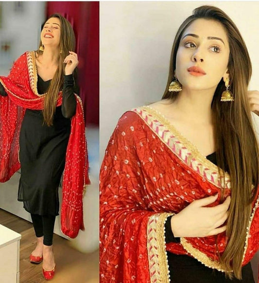Black georgette salwar suit with red dupatta