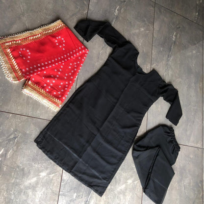 Black georgette salwar suit with red dupatta