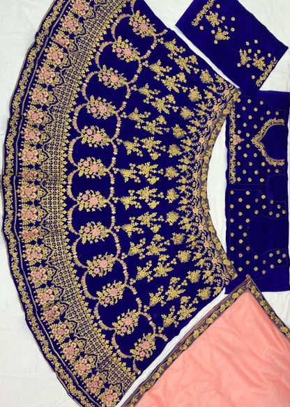 Blue velvet heavy embroidered bridal lehenga