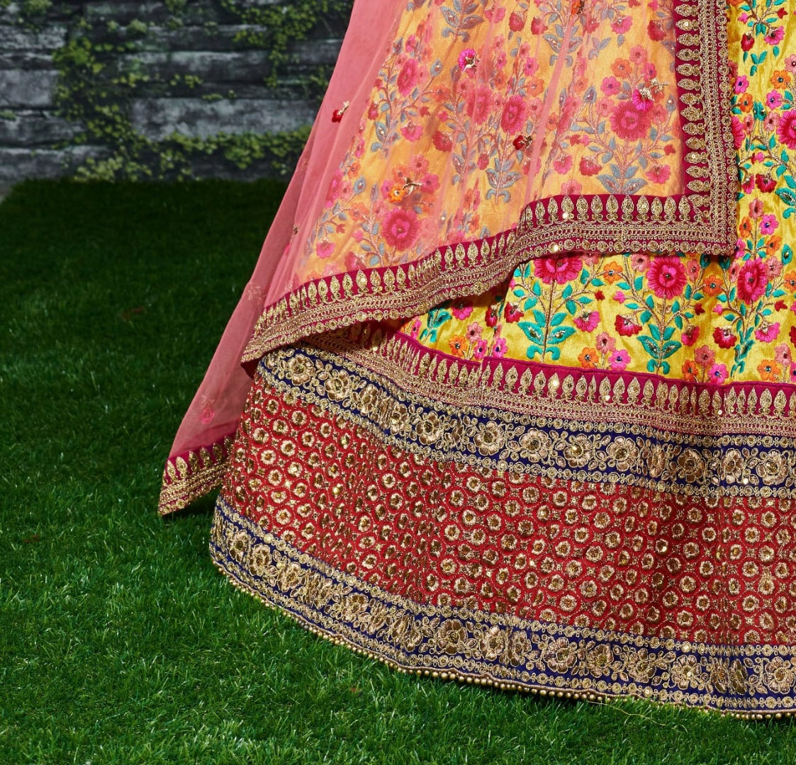 Yellow mulbury silk heavy embroidered bridal lehenga for haldi function