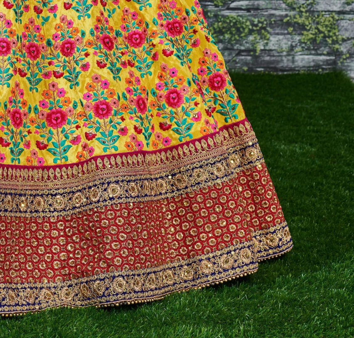 Yellow mulbury silk heavy embroidered bridal lehenga for haldi function
