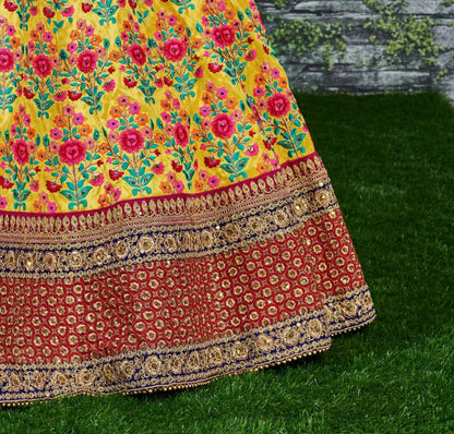 Yellow mulbury silk heavy embroidered bridal lehenga for haldi function