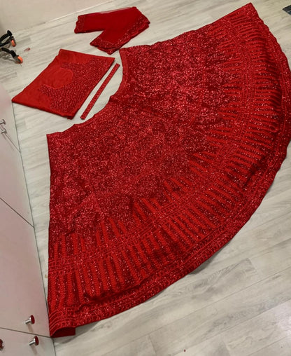 Red heavy embroidered sequence worked wedding lehenga choli