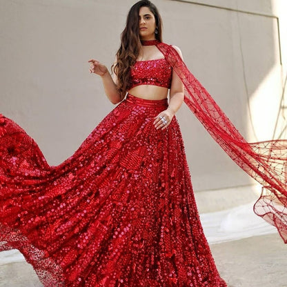 Red soft net heavy sequence work wedding lehenga choli