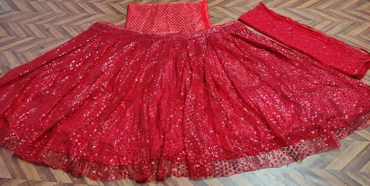 Red soft net heavy sequence work wedding lehenga choli