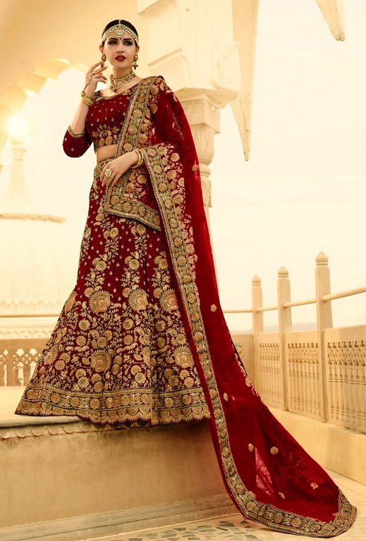 Heavy maroon phantom silk embroidered bridal lehenga