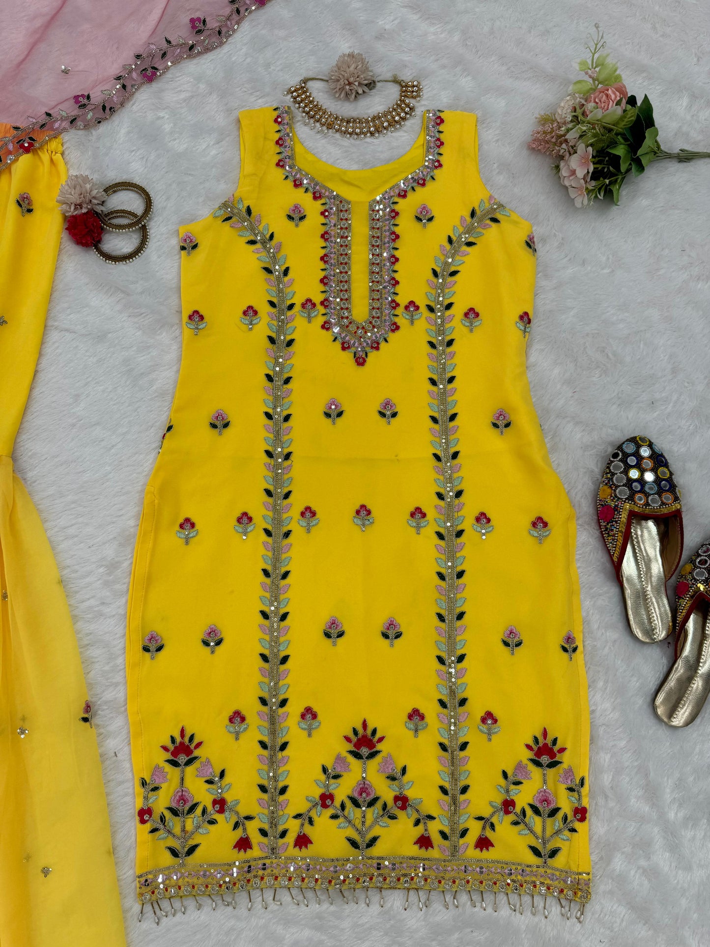 Yellow georgette embroidered sharara suit for haldi ceremony