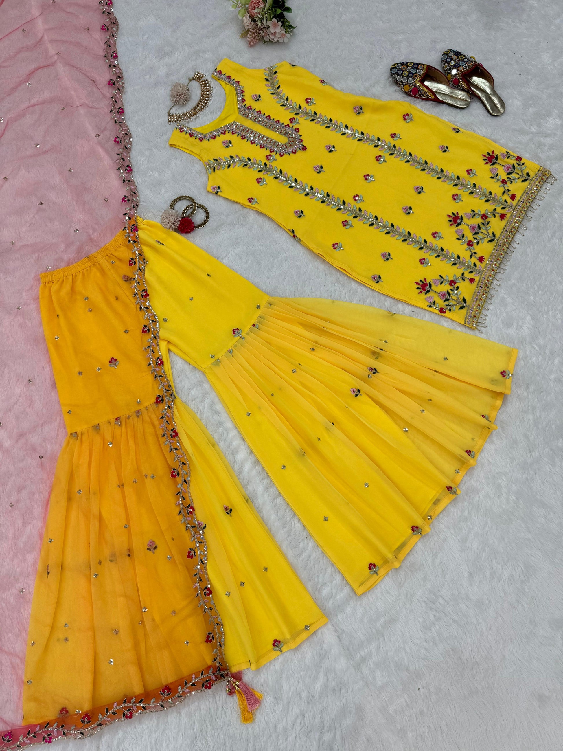 Yellow georgette embroidered sharara suit for haldi ceremony