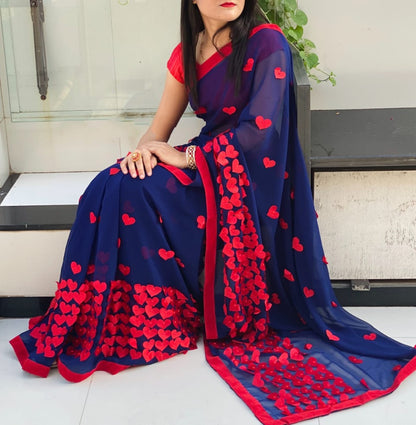 Baby pink georgette heart embellished saree