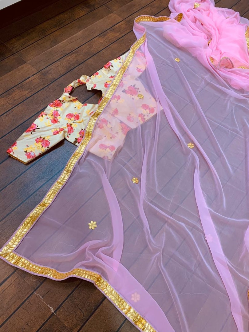 Baby pink georgette saree with floral printed blouse