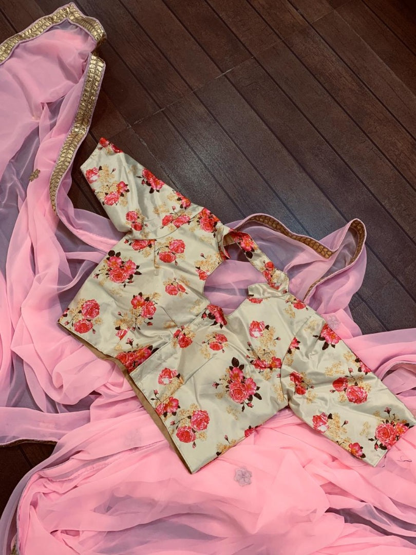 Baby pink georgette saree with floral printed blouse