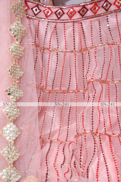 Baby pink mono net heavy embroidered wedding lehenga choli