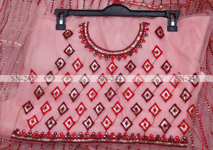 Baby pink mono net heavy embroidered wedding lehenga choli