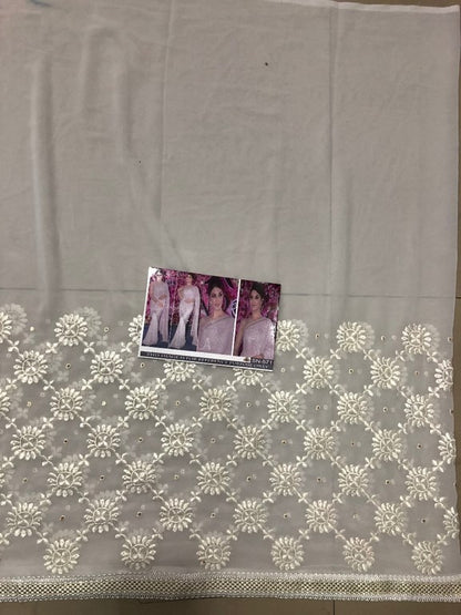 Beautiful bollywood style white ceremonial saree