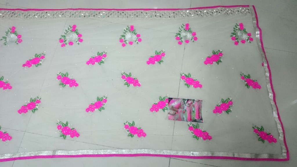 Beautiful cream and pink embroidered saree