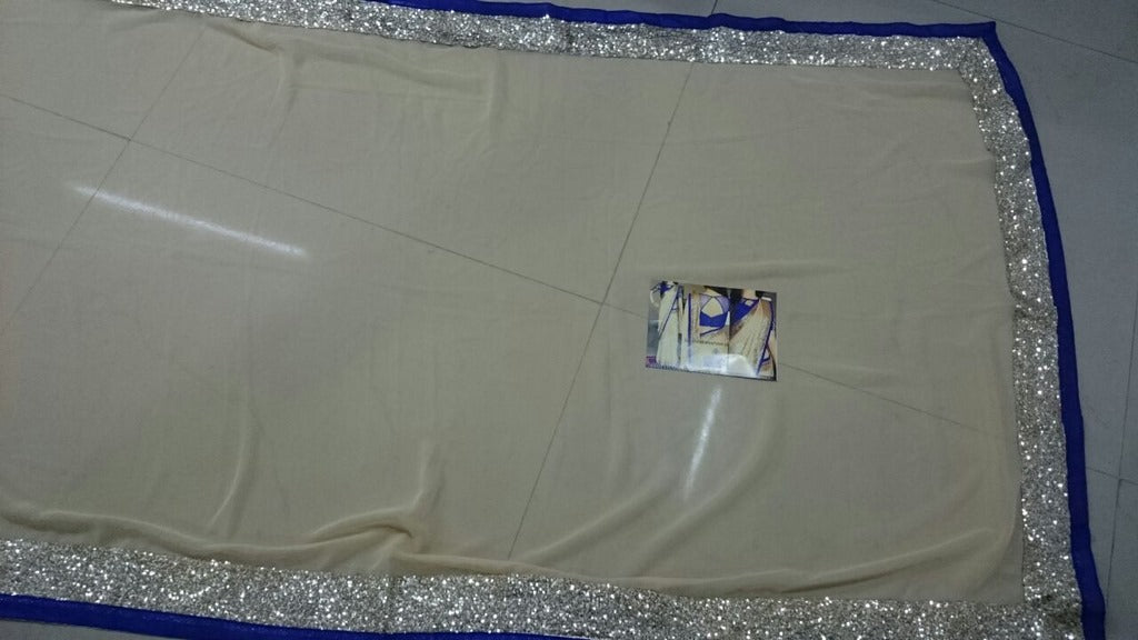 Beautiful cream saree with fancy blouse