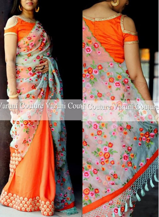 Beautiful multicolor thread work designer orange saree