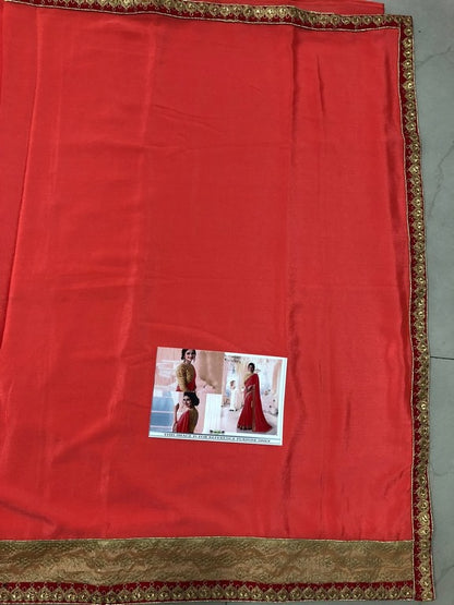 Beautiful neon orange embroidered partywear saree