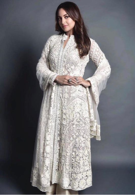 Beautiful white embroidered plazzo salwar suit
