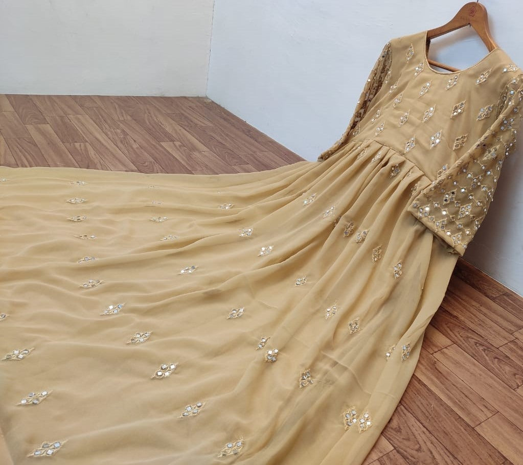 Beige georgette embroidered and mirror work gown