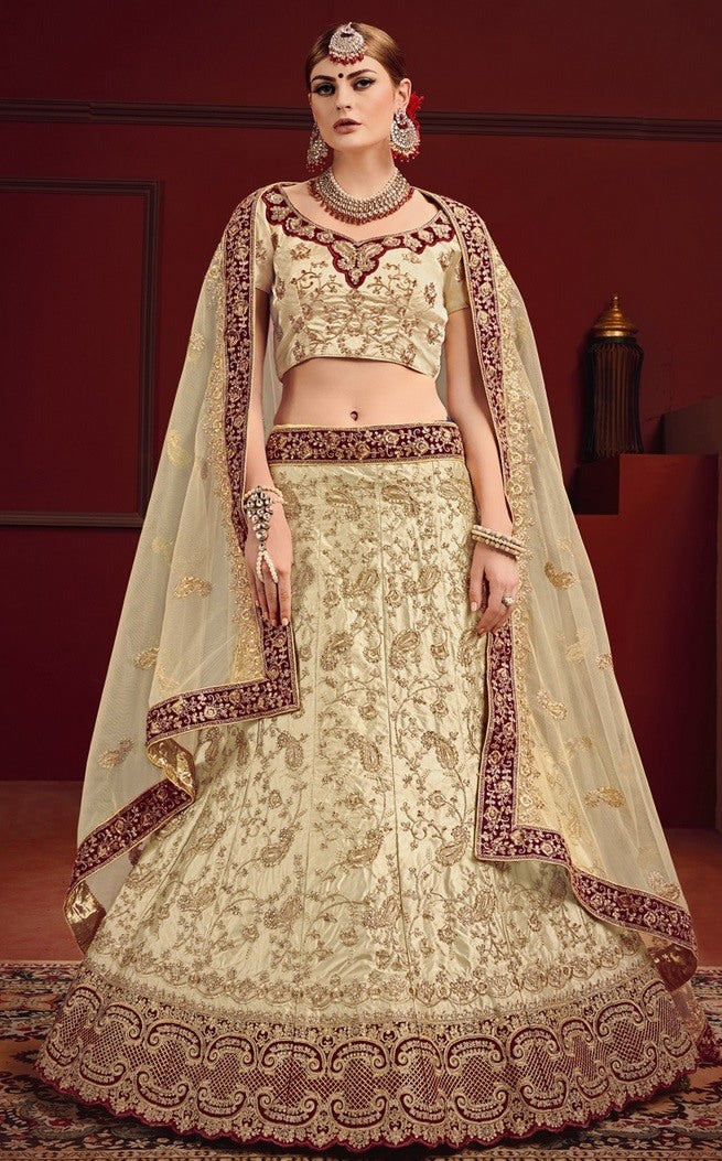 Beige heavy designer embroidered bridal lehenga choli