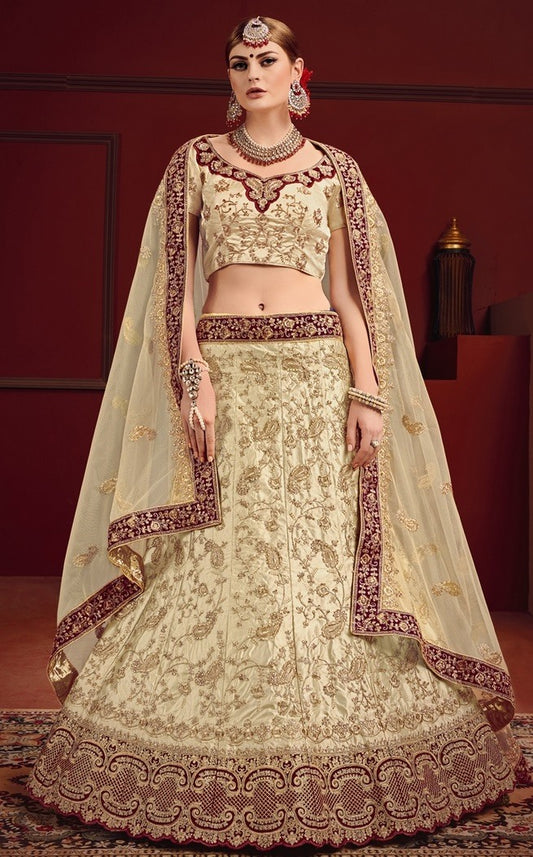Beige heavy designer embroidered bridal lehenga choli