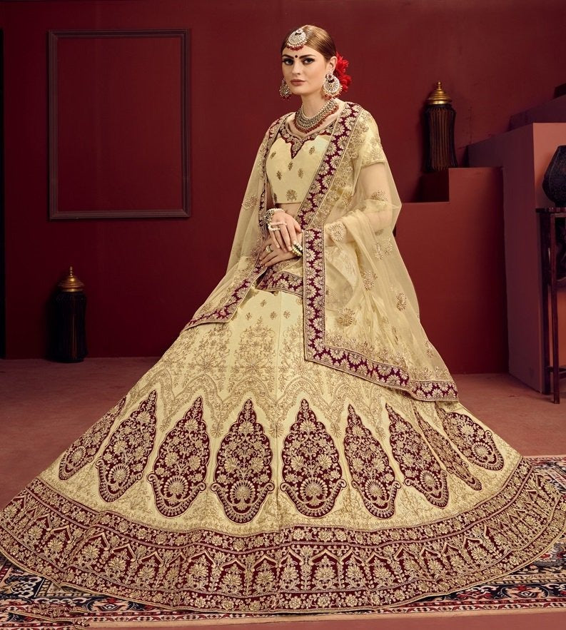 Beige heavy designer embroidered bridal lehenga choli