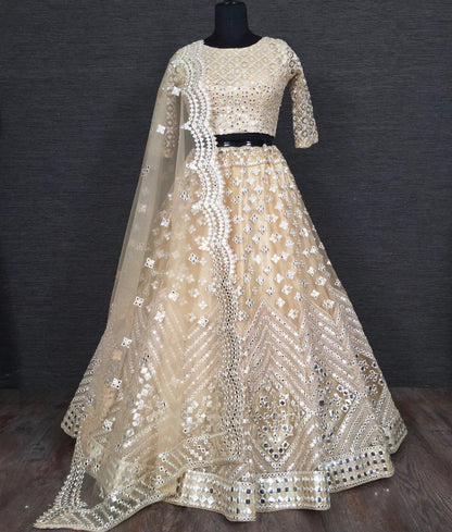 Beige soft heavy net paper mirror and thread work bridal lehenga choli