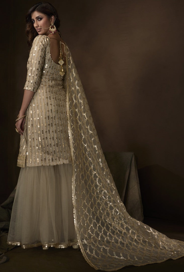 Beige soft net sequence work party wear sharara salwar suit