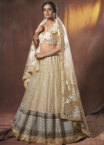 Beige soft net sequence zari work ceremonial lehenga choli