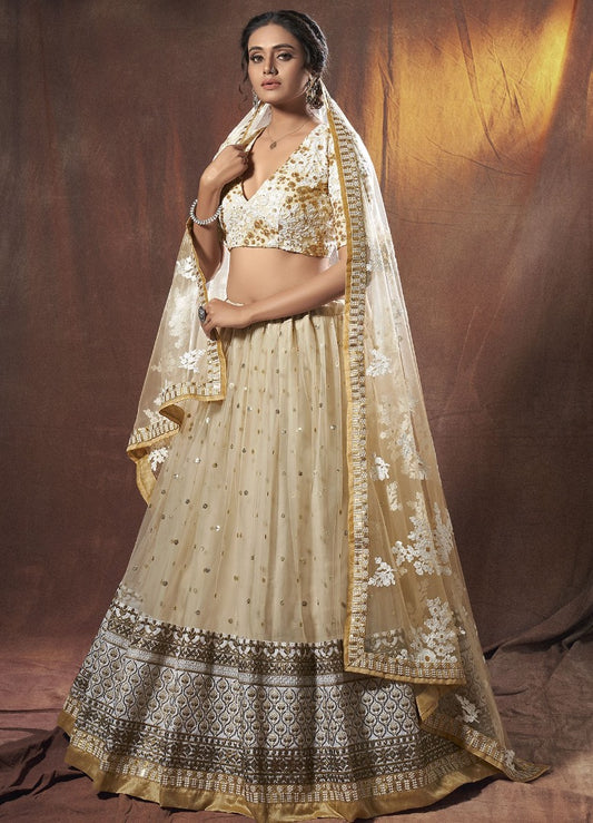 Beige soft net sequence zari work ceremonial lehenga choli