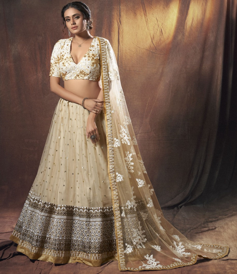 Beige soft net sequence zari work ceremonial lehenga choli