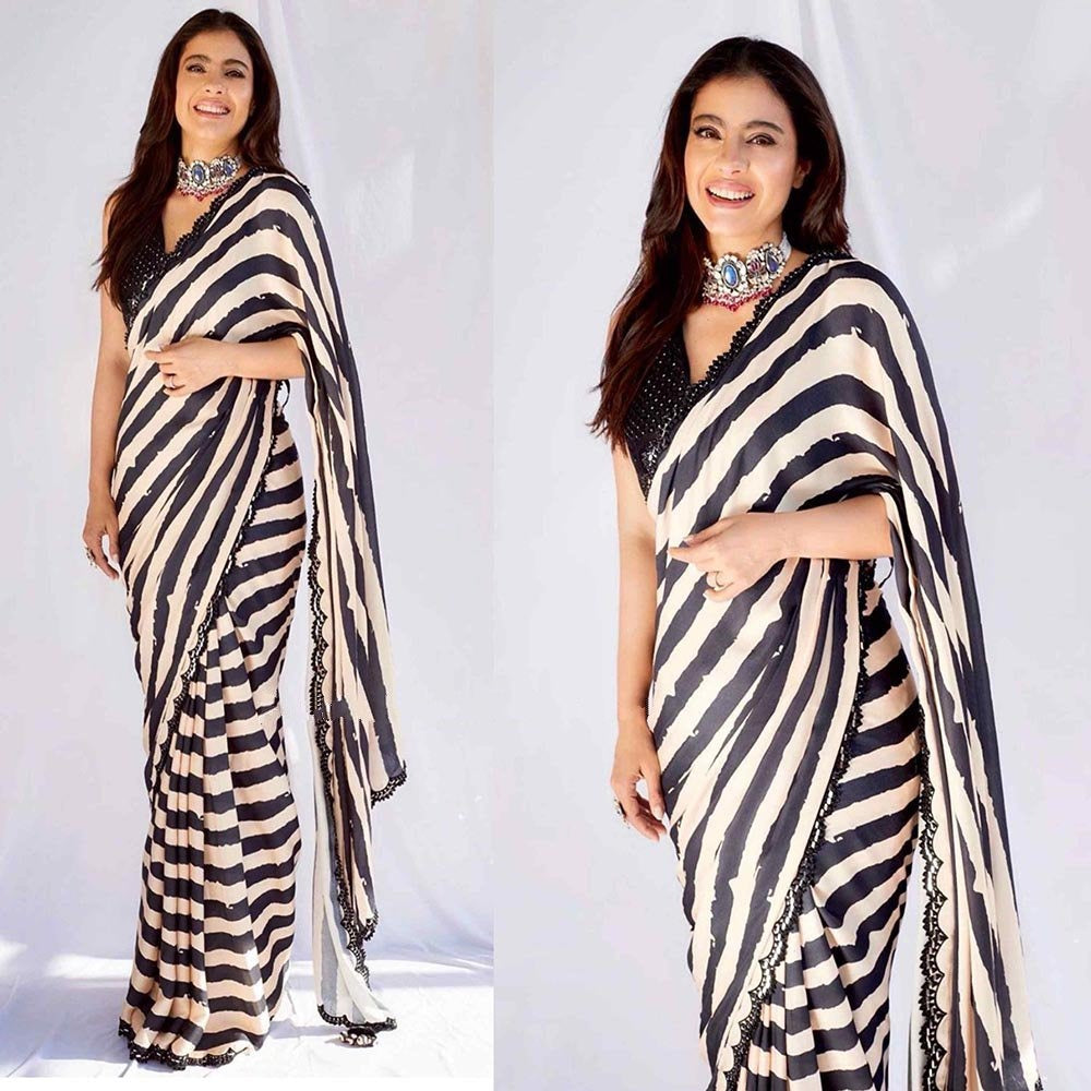 Black and off white strip printed georgette saree
