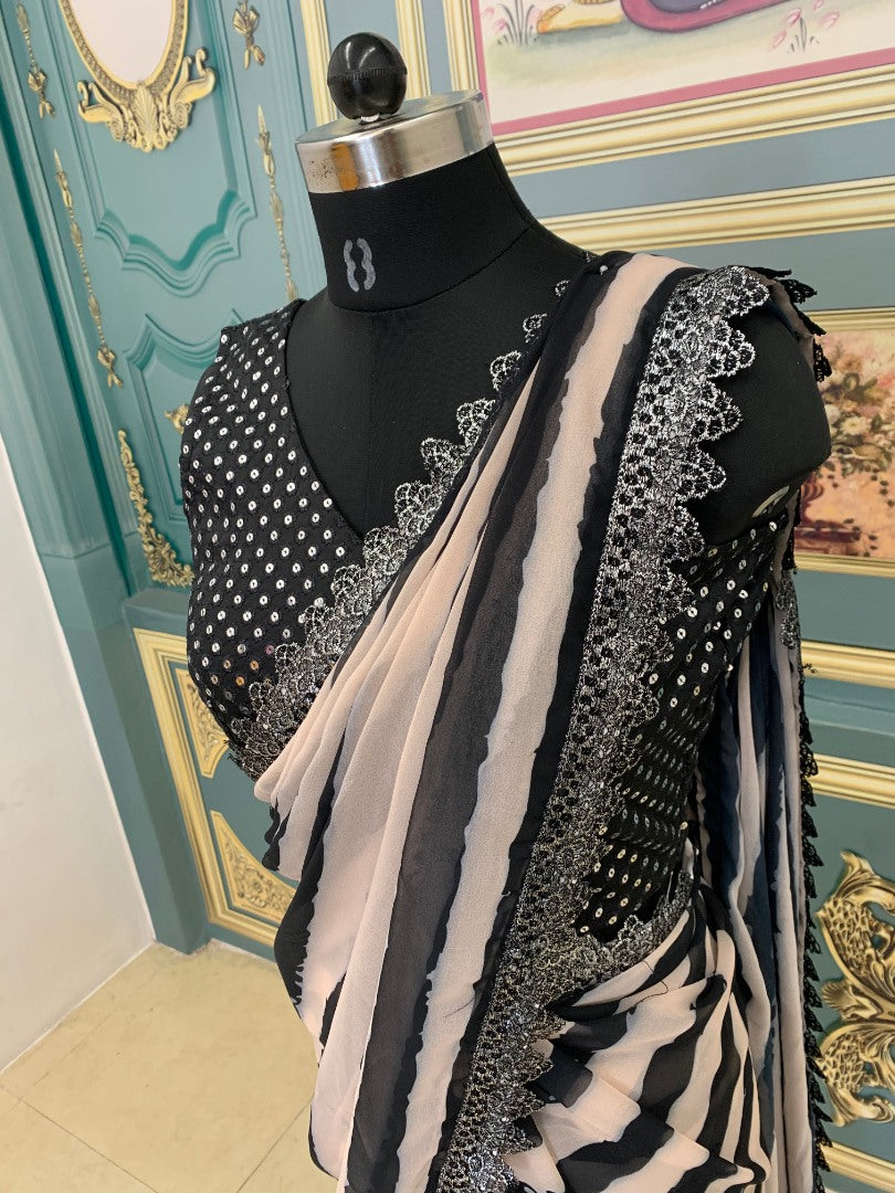 Black and off white strip printed georgette saree