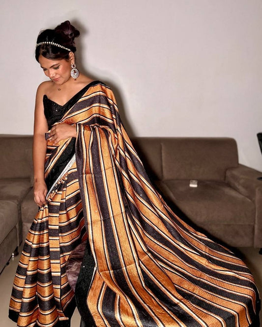 Black and orange print and sequence work party wear saree