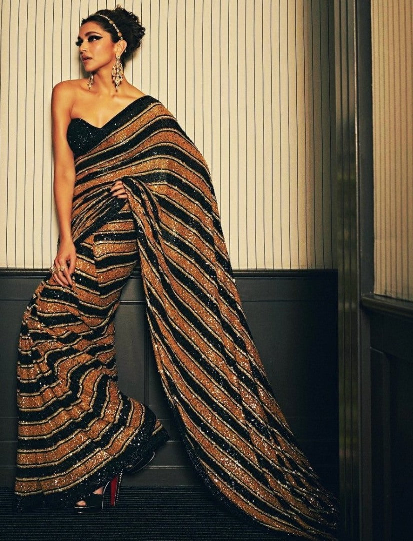 Black and orange stripe sequence work designer party wear saree