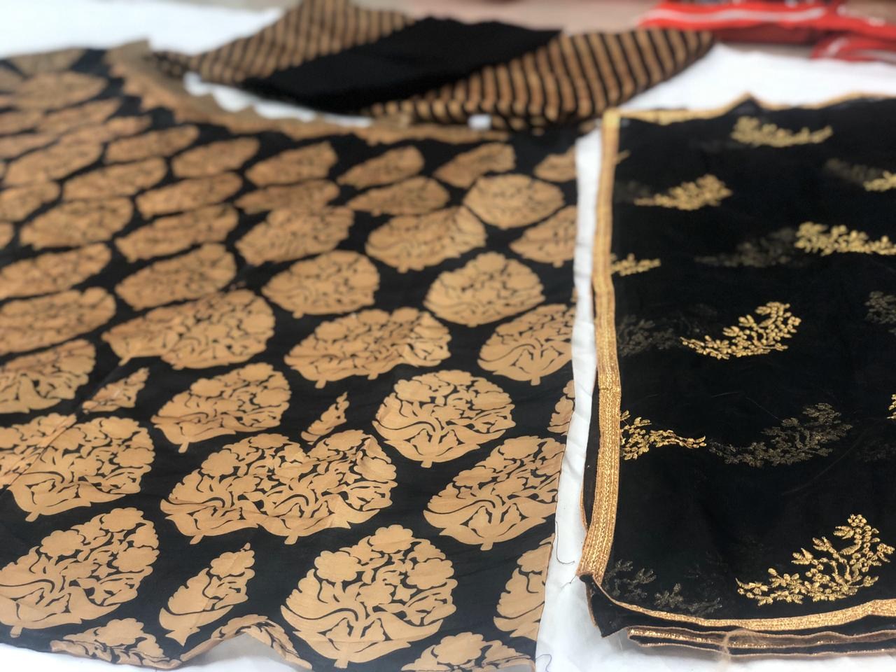 Black banglory satin golden print lehenga choli for ceremony