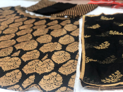 Black banglory satin golden print lehenga choli for ceremony