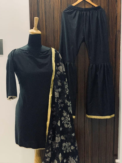 Black crepe sharara suit with printed dupatta