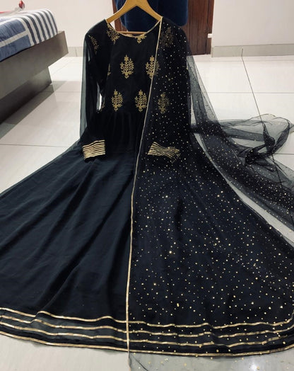 Black embroidery worked long anarkali suit
