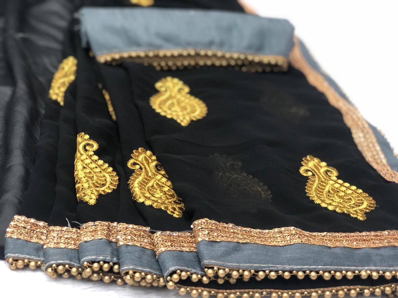 Black georgette embroidered and moti lace partywear saree