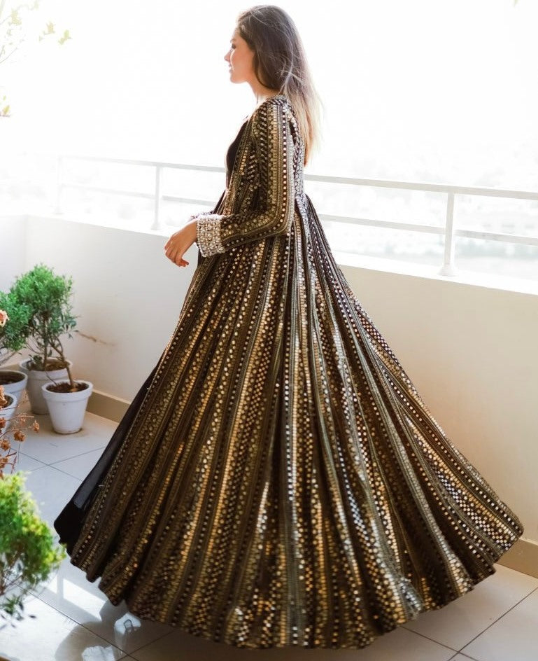 Black georgette gown with heavy embroidery work koti shrug